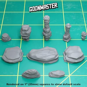 May include: A set of 9 gray 3D printed rock formations, rendered on 1 inch squares to show scale.  The rocks are various sizes and shapes, with some stacked on top of each other.