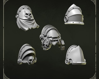 May include: Five gray shoulder pads with skull and armor designs. The shoulder pads are in various shapes and sizes, with details like rivets, chains, and a skull-shaped face. The text "Shoulder pads 3" is at the top.