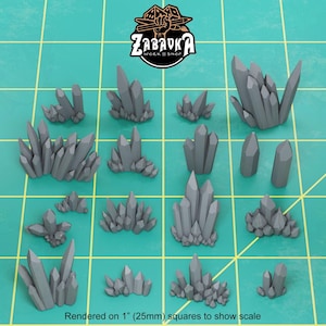 May include: A collection of 15 gray crystal rock formations, rendered on 1-inch squares to show scale. The crystals are various sizes and shapes, with some appearing more jagged than others.