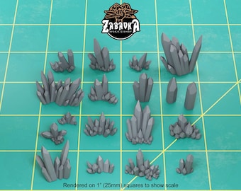 May include: A collection of 15 gray crystal rock formations, rendered on 1-inch squares to show scale. The crystals are various sizes and shapes, with some appearing more jagged than others.