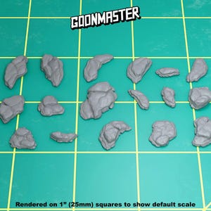 May include: A set of 15 grey resin rock formations, rendered on 1" (25mm) squares to show default scale.  The rocks are various shapes and sizes, perfect for tabletop gaming or miniature scenery.