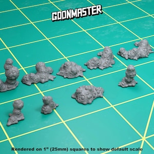 May include: A set of 10 grey resin 3D printed miniature alien creature models. The models are rendered on 1 inch squares to show the default scale.