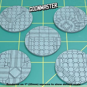 May include: Five gray, round, 1 inch (25mm)  miniature gaming bases with a detailed, patterned design of a stone floor. The bases are rendered on a green surface.  The text "GOONMASTER" is visible in the upper right corner of the image.