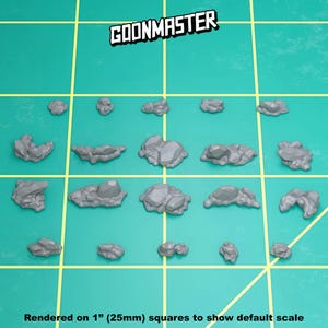 May include: A collection of nineteen unpainted grey miniature rock formations arranged in a grid. The text GOONMASTER appears at the top, and the text Rendered on 1" (25mm) squares to show default scale appears at the bottom of the image.
