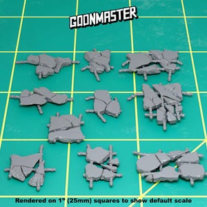 May include: Nine different designs of broken concrete pieces, rendered on 1" (25mm) squares to show default scale.  These are 3D printed models for tabletop gaming.
