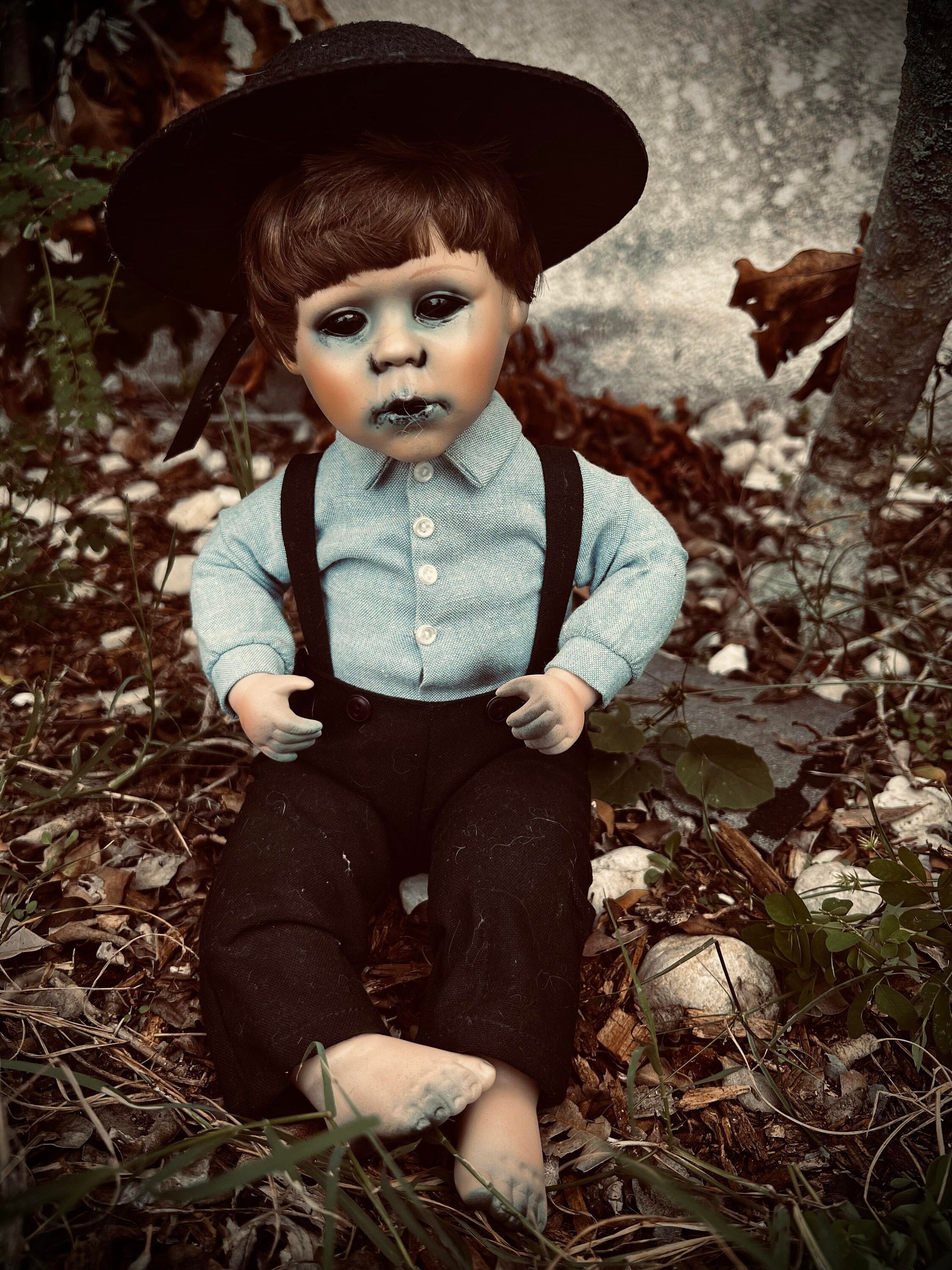 Haunted male doll sale