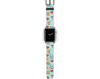 May include: A smartwatch with a light blue silicone band featuring a repeating pattern of medical icons including red hearts, stethoscopes, adhesive bandages, pill bottles, and white medical kits with a black buckle and a black watch face.