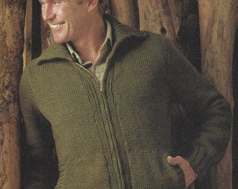 May include: A close-up of a man wearing a dark green knitted cardigan with a zipper. The cardigan has a ribbed collar and cuffs.