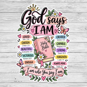 May include: A decorative sticker featuring the text God says I AM and I am who You say I AM, centered around a pink Holy Bible illustration. The design includes colorful labels with biblical affirmations like Loved, Chosen, and Strong, accented by flowers, hearts, a crown, and butterflies.