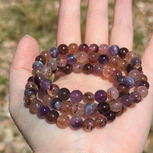 Super Seven Bracelet, Amethyst, Cacoxenite, Goethite, Lepidocrocite, Quartz, Rutile, and Smoky Quartz  stretch bracelet