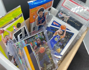 NBA Blaster Box - 1 GRADED CARD, 2 Packs, 1 Hit (Patch, Auto, or Numbered Card)