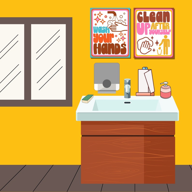 May include: A white bathroom sink with a brown cabinet underneath. The sink has a chrome faucet and a bar of soap on the counter. There are two posters on the wall behind the sink. One poster says "Wash your hands" and the other says "Clean up after yourself".