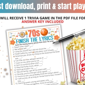 May include: A trivia game sheet with the text "Finish the Lyrics" and a 70s theme. A pen and a popcorn container are next to the sheet. The popcorn container has red and white stripes and the word "fresh".