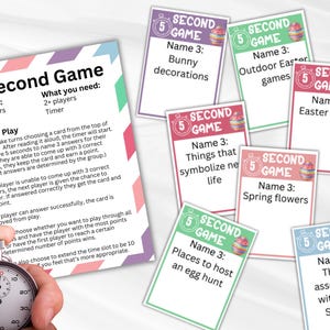 May include: A colorful card game titled "5 Second Game" with instructions and various themed cards. The cards feature prompts like "Bunny decorations" and "Easter colors." A timer is held in the foreground, suggesting a timed gameplay element.