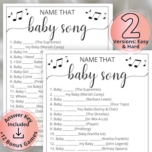 May include: Two white paper game sheets titled Name That Baby Song with black text and musical note icons. Each sheet features a numbered list of fill-in-the-blank song titles with artist names in parentheses. Pink circular badges state 2 Versions: Easy & Hard and Answer Key Included + 12 Bonus Games.