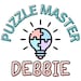 PuzzleMasterDebbie store logo