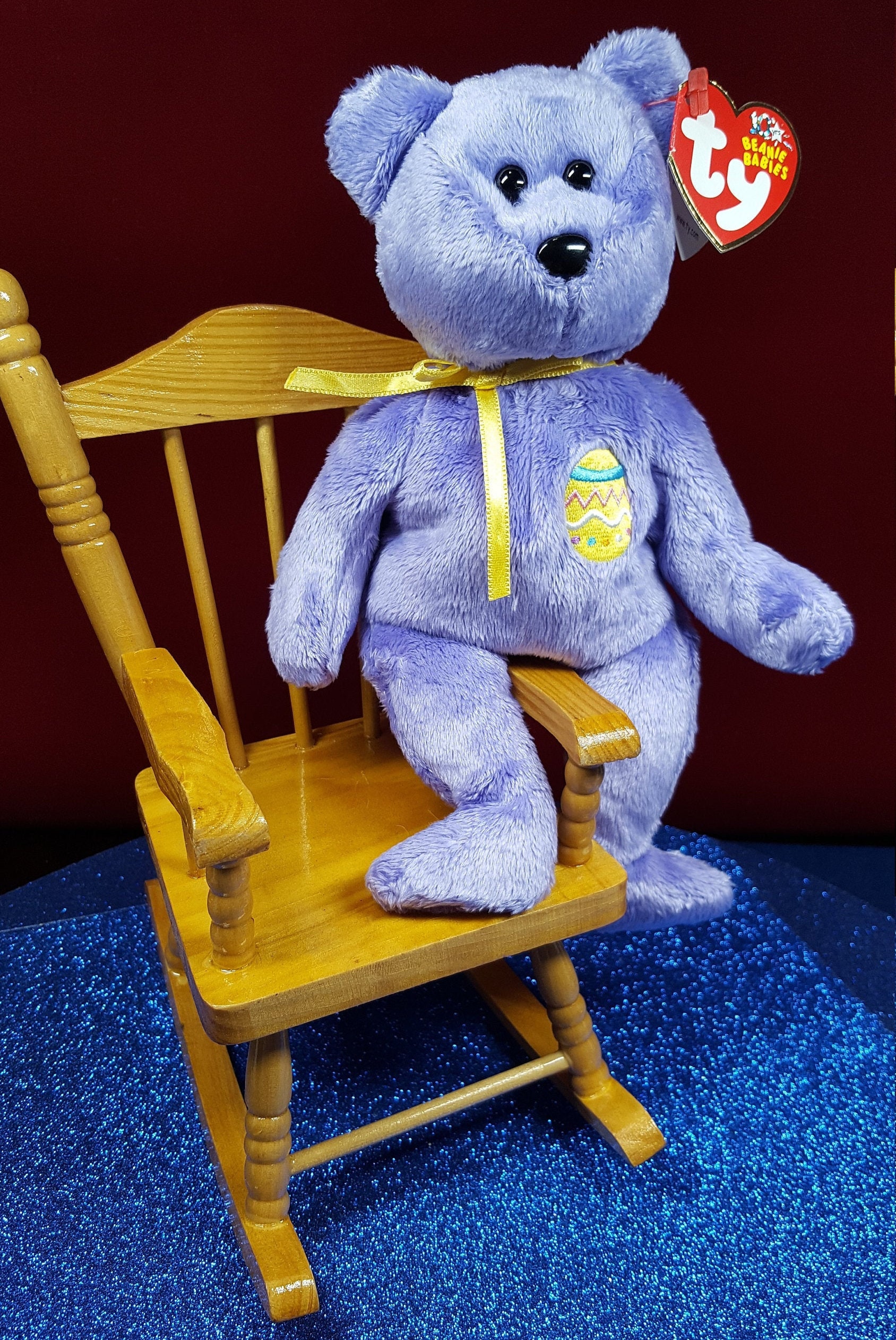 Purple Easter Bear eggs Iii from TY Beanie Baby in a Wooden Rocking