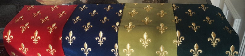 May include: Four fabric swatches with a repeating pattern of gold fleur-de-lis on different coloured backgrounds: red, navy blue, olive green, and forest green.