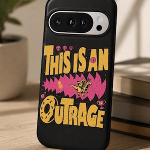 May include: A black smartphone case featuring a graphic design with the yellow text "THIS IS AN OUTRAGE". The design includes a pink jagged shape, a small dinosaur, a pineapple, a donut, a trophy, and three small pink skull icons above the text.