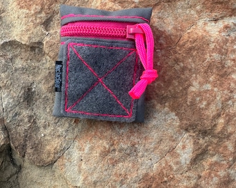 mini pouch in wolf gray with hot pink zipper and stitching