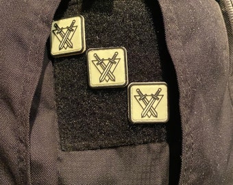 Black RecTacGear logo over white/glow in the dark Ranger eyes