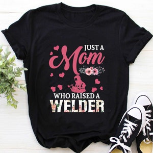 Welder Shirt | Welding T-Shirt | Welder Gift | Gifts for Welders Mom | Just A Mom Who Raised A Welder Happy Floral Mother's Day Shirt