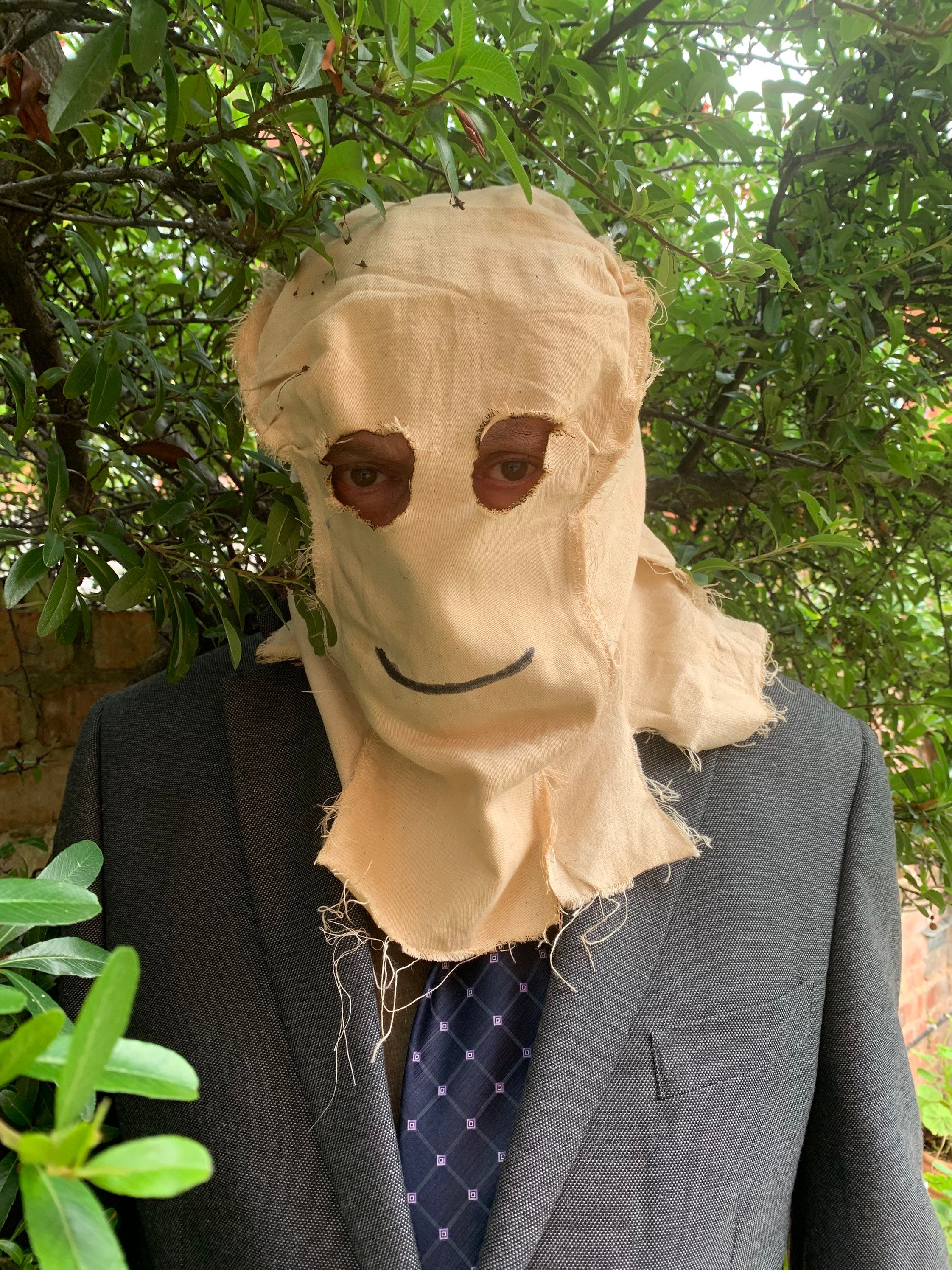Buy on the official website the strangers movie man in the mask costume
