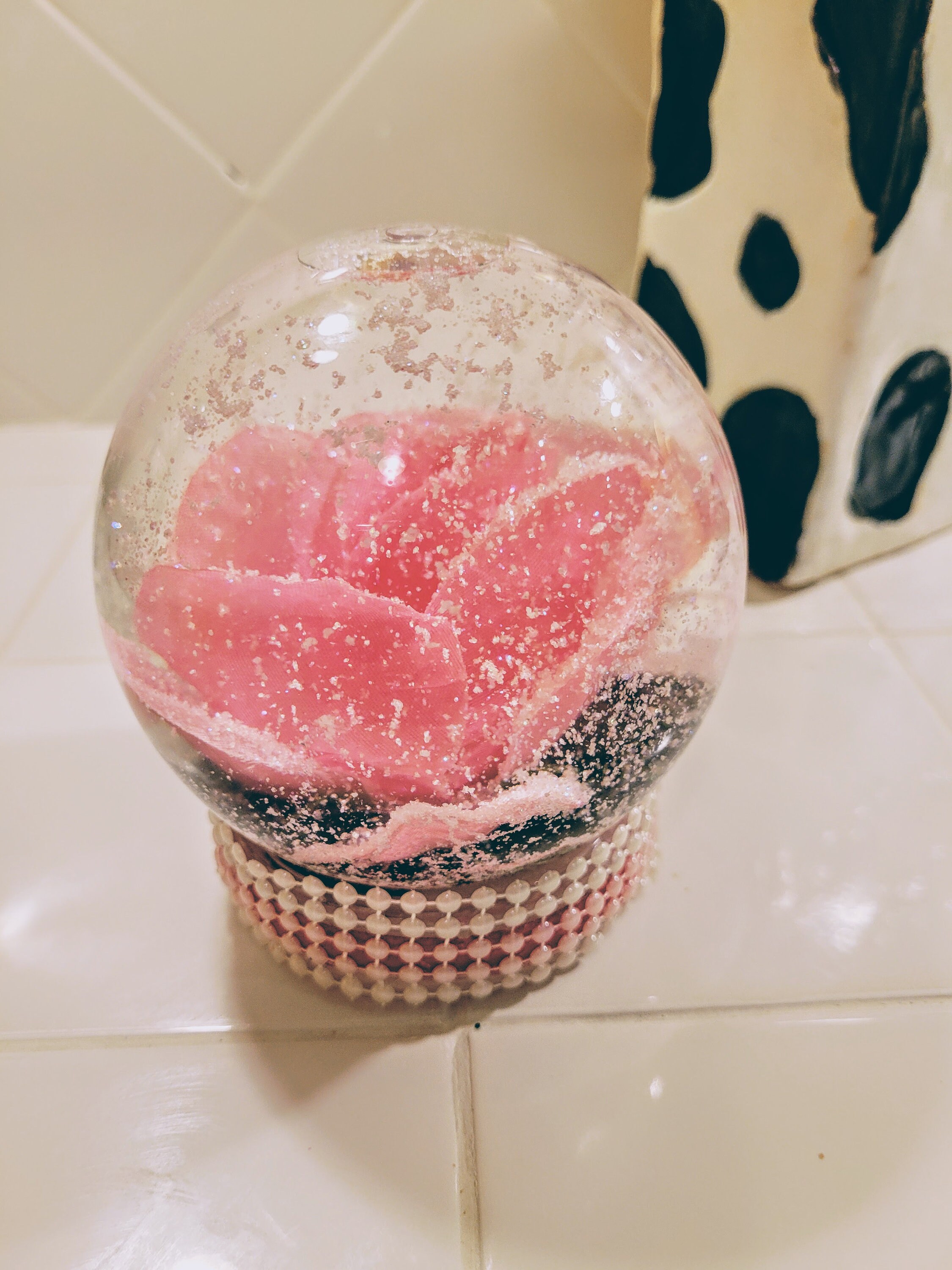 Glittering flower water globe Etsy