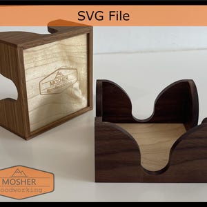 May include: Two wooden desk organizers, one upright and one open, with a light wood interior and dark wood exterior. The upright organizer has the text "SVG File" and a logo that says "MOSHER Woodworking".