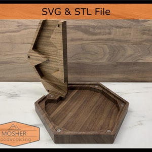 May include: A wooden hexagonal tray with a removable lid. The lid is shaped like a triangle with a curved edge. The tray and lid are made of dark wood with a natural grain pattern. The text "SVG & STL File" is printed in white on a orange background at the top of the image.