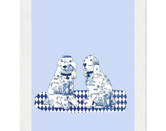 May include: A framed print featuring two dogs with blue and white floral patterns. The dogs are sitting on a blue and white diamond-patterned surface against a light blue background. The frame is white.