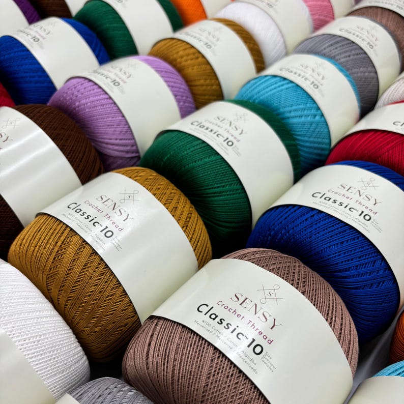 May include: A variety of colorful yarn balls with the label "SENSY Crochet Thread Classic 10" on each ball.