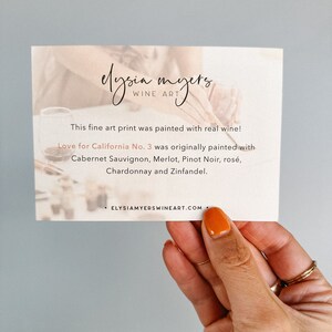 May include: A white card with the text "elysia myers, WINE ART" and the text "This fine art print was painted with real wine! Love for California No. 3 was originally painted with Cabernet Sauvignon, Merlot, Pinot Noir, ros&eacute;, Chardonnay and Zinfandel. ELYSIAMYERSWINEART.COM"