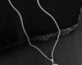 Men's 3/4 CT. T.W. Black and White Diamond Compass Medallion Pendant in 10K Gold - 22 Men's 3/4 CT. T.W. Black and White Diamond Compass Medallion Pendant in 10K Gold - 22