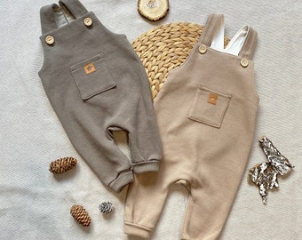 Romper baby 50-92 wafel jersey beige zand/taupe bruingrijs jongensmeisje tuinbroek romperpakje