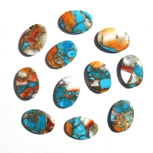May include: Ten oval-shaped turquoise cabochons with a mix of orange, white, and gold accents. The stones are set against a white background.