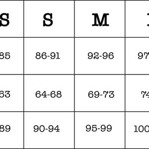 May include: A black and white size chart with measurements for bust, waist, and hips. Sizes range from XS to XL, with bust measurements from 80-107 inches, waist from 59-83 inches, and hips from 84-109 inches.