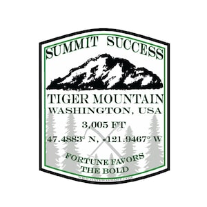 May include: A green and black illustrated badge with the text "Summit Success" and "Tiger Mountain, Washington, USA". The badge also includes the mountain's elevation, "3,005 ft", and coordinates, "47.4883° N, -121.9467° W". The text "Fortune Favors The Bold" is also included on the badge.