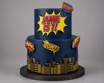Precut edible comic book buildings / skyscrapers - superhero Birthday theme cake toppers set with speech bubbles - Kapow Boom Pow Oops Crash