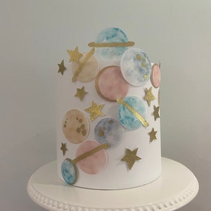 Adorno comestible para oblea con temática espacial, planetas y estrellas, con detalles dorados. Decoraciones comestibles para pasteles y cupcakes. Sistema solar. PL01