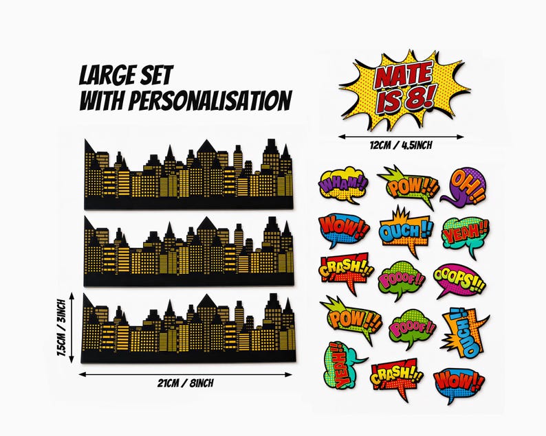 Puede incluir: Un conjunto grande de tres recortes de siluetas urbanas en negro y dorado de 21 cm por 7,5 cm, junto a varias burbujas de di&aacute;logo estilo c&oacute;mic con textos como WHAM, POW, OUCH, y un letrero personalizado NATE IS 8! de 12 cm.