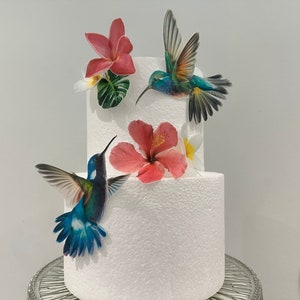 A pair of hummingbirds precut edible wafer topper set for weddings, anniversaries and birthdays