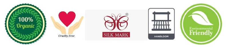 May include: A green circle with a wreath of leaves and the text "100% Organic". A red heart in two hands with the text "Cruelty Free". A white rectangle with a butterfly logo and the text "SILK MARK". A gray rectangle with a loom icon and the text "HANDLOOM". A green circle with a white leaf and the text "Environmental Friendly".