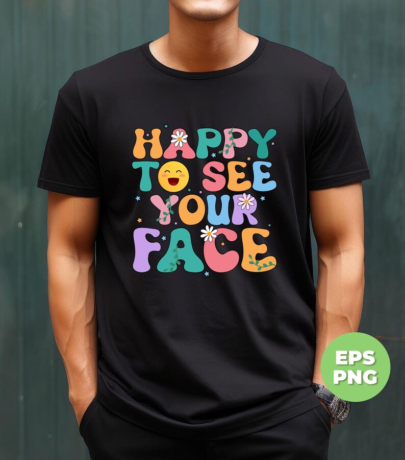 May include: A black t-shirt with a colorful graphic that says "Happy to see your face". The graphic features a smiling emoji, flowers, and vines.