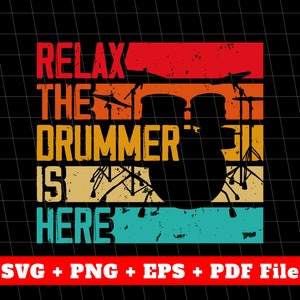 May include: A retro-style graphic design with a drum set silhouette and the text "Relax the drummer is here". The design features a red, orange, yellow, green, and blue color scheme.