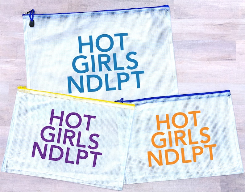 May include: Three clear plastic zippered pouches with mesh fabric. Each pouch has the text "HOT GIRLS NDLPT" printed on it in a different color: blue, purple, and orange.