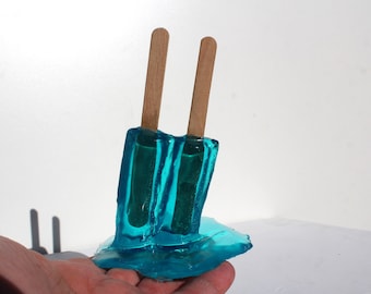 Resin twin popsicle double stick melting sucker sculptures, teal, find out more.