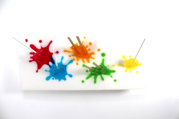 Resin popsicles and suckers splat on the wall 3D art.  Colorful fun wall art find out more.