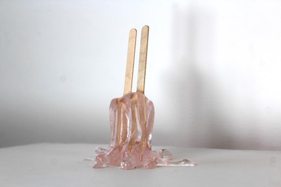 Resin twin popsicle double stick melting sucker sculpture splat on the table light pink find out more.