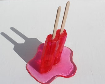 Resin twin popsicle double stick melting sucker sculptures, cherry red, find out more.